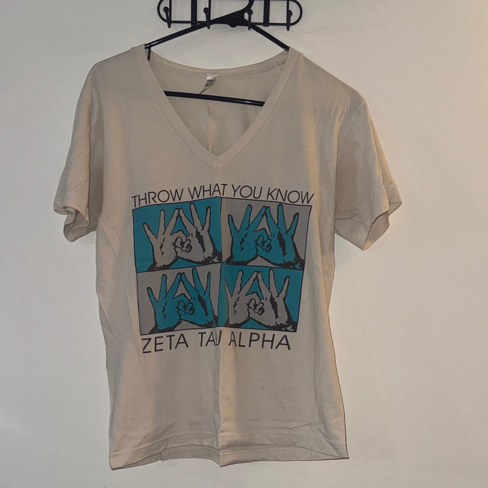 ZTA Graphic V-Neck T-Shirt with Blue and Cream ZTA crown design